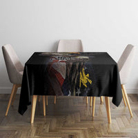Black tablecloth with large vintage eagle and stars print, centered on the dining table.