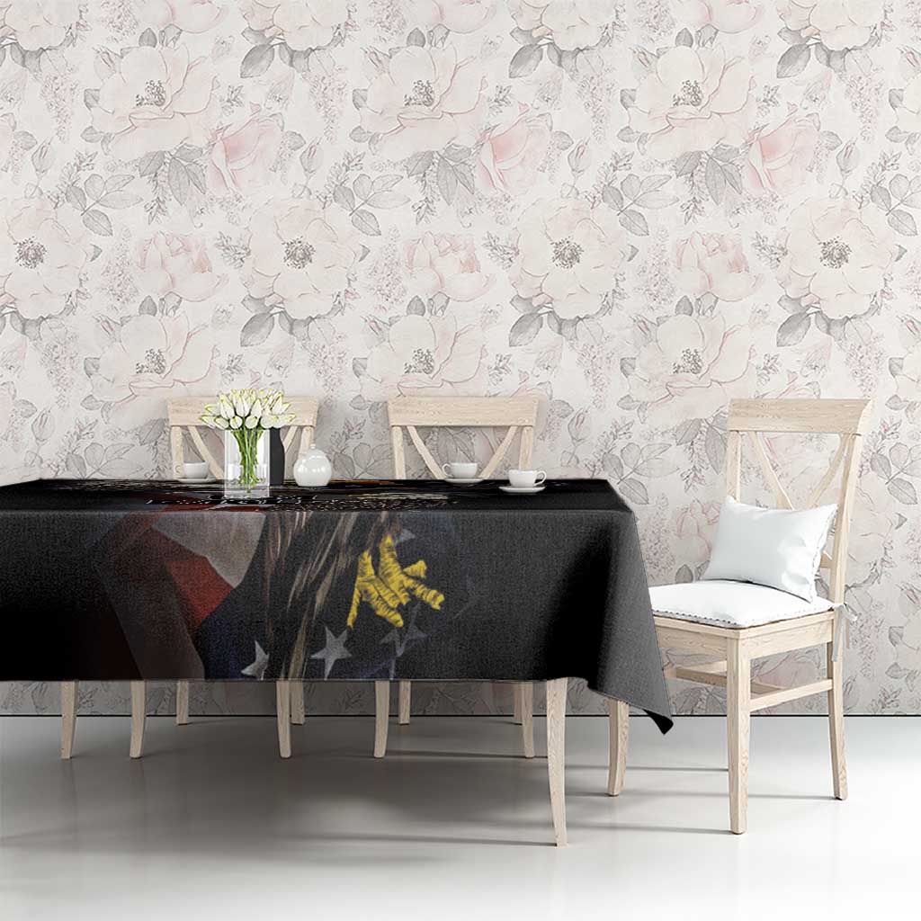 Black tablecloth showing vintage eagle and star graphic along the front of the table.