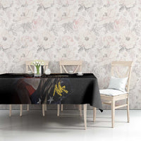 Black tablecloth showing vintage eagle and star graphic along the front of the table.