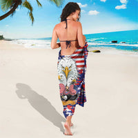 Blue-red camouflage sarong with eagle and stars; tied back wrap
