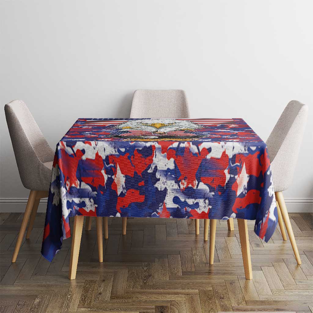 Rectangular tablecloth with bold red, white, and blue camouflage flag print on table