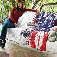 Baseball quilt blanket draped over couch in white, navy, and red with champion logo