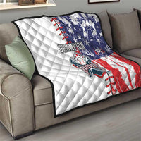 Quilted baseball blanket on sofa with white background and navy-red stars and stripes