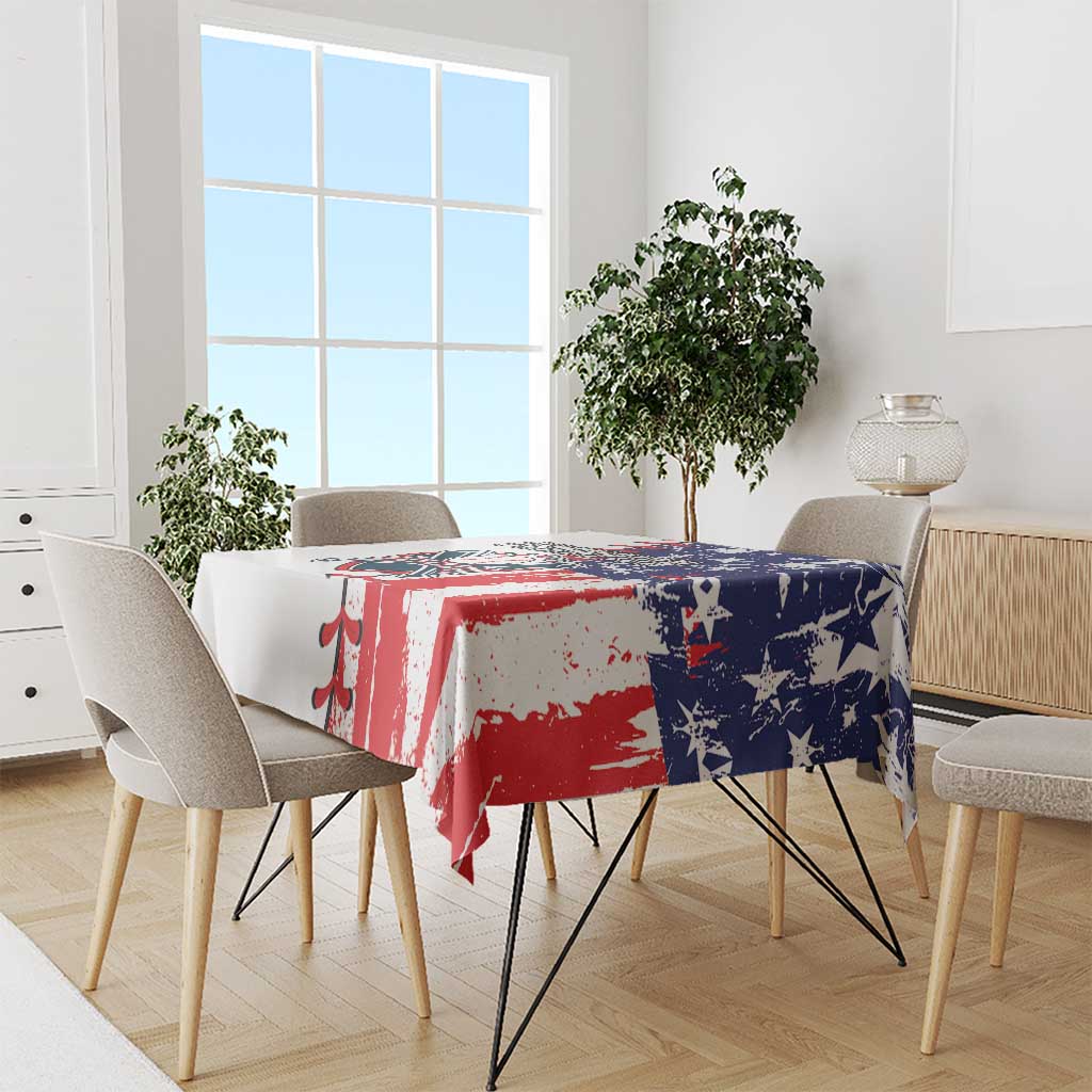 Patriotic baseball tablecloth on dining table with chairs, red white stripes and blue stars