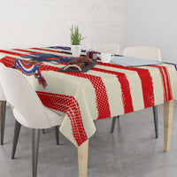 Football-themed tablecloth with red and white stripes, blue star pattern, and mascot graphic