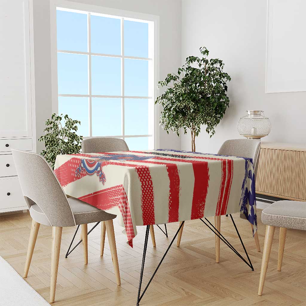 Football-themed tablecloth on dining table with red-and-white stripes and blue stars
