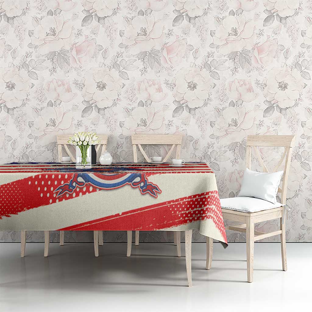 American football-themed tablecloth with red stripes, blue star accent, and mascot design
