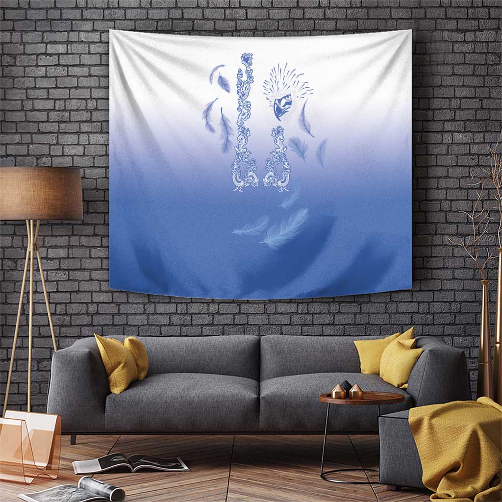 Blue gradient tapestry with white and light-blue eagle feather emblem