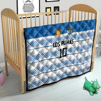 Blue quilt with quilted top and blue-white checkered bands, LOS PUMAS and number 10