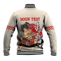 Beige baseball jacket back with red samurai design and "Your text" print, striped cuffs