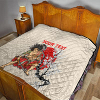 Beige bed quilt with diamond stitching, red “YOUR TEXT” and samurai cherry blossom artwork.