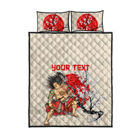 Beige quilt bed set with red lettering and samurai under cherry blossoms; 2 square pillows