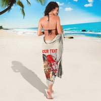 Beige sarong with red personalized text and samurai print on the back