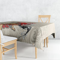 Beige tablecloth with red warrior banner and gray ornamental swirl pattern