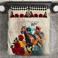 Cream bedding set with horse race graphic, red roses, and black check pillow trim.