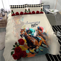 Cream duvet and two pillows featuring horse race artwork, red roses, and black check trim.