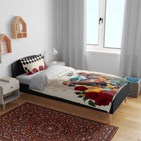 Cream duvet on bed with horse race print, red roses, and black check accent pillows.
