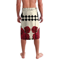 White swim shorts with black diamond pattern and red rose print