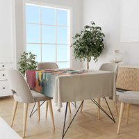 Colorful horse and rose print tablecloth covering a dining table