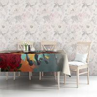 Horse and rose print tablecloth on dining table with matching chairs