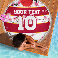 Round beach blanket with fringed edge, red/white sakura pattern and large 10 design