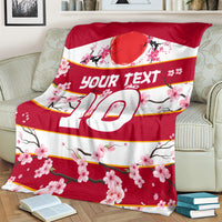 Red rugby blanket: 'Your text 10' with pink cherry blossom print