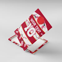 Angled view of red cherry blossom canvas wall art with large “10” custom text
