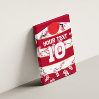 Red canvas wall art with cherry blossoms and large “10” custom text on wall