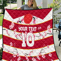Red rugby quilt with cherry blossoms, 'YOUR TEXT' and large 10, diamond quilt stitching