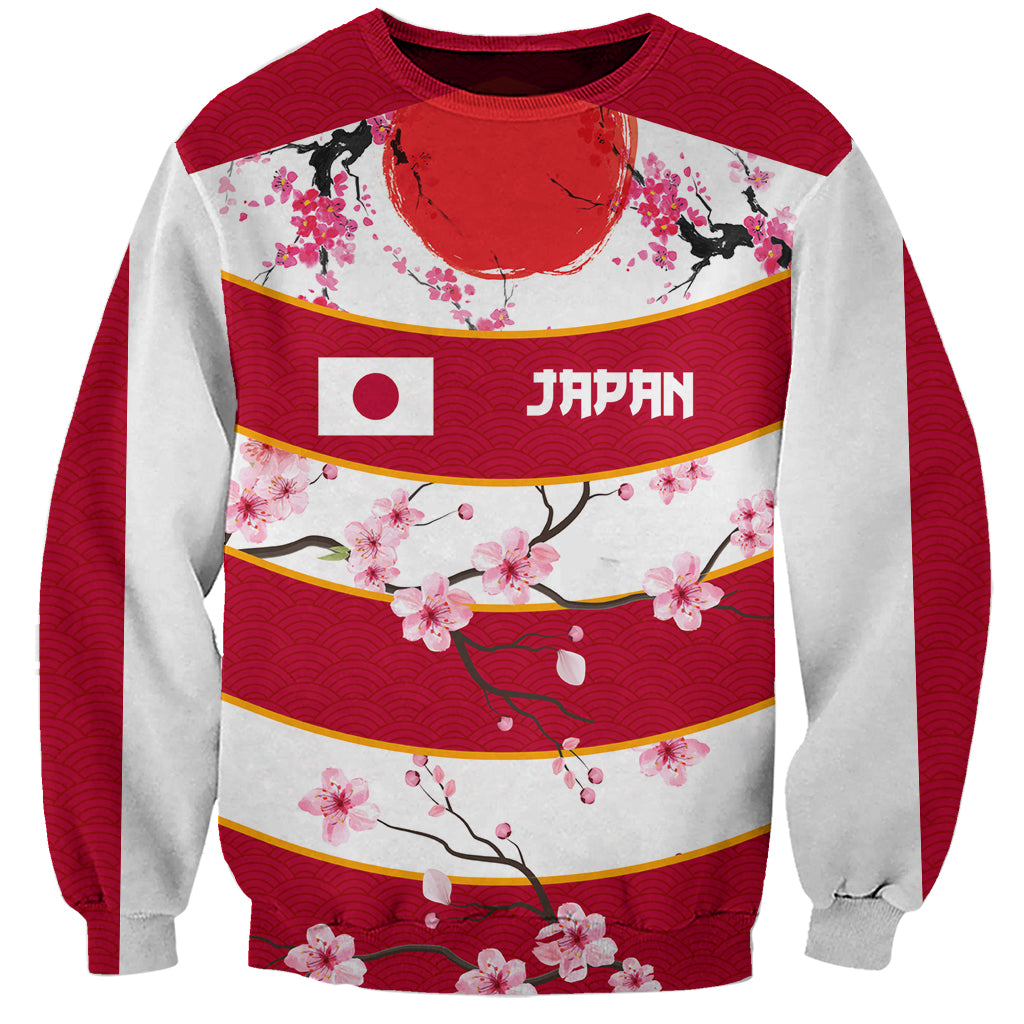 Red and white pullover sweatshirt with sakura blossoms, Japan flag stripe graphic, crew neck