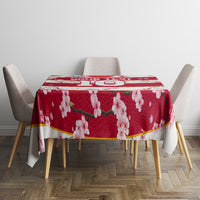 Red cherry blossom tablecloth with gold stripe, “10” motif, and pink flower pattern