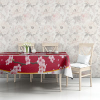 Red cherry blossom tablecloth with floral branches and gold diagonal accent stripes