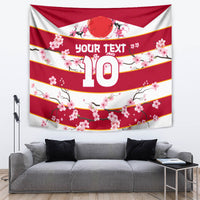 Red and white cherry blossom wall tapestry with center number 10 design