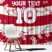 Red and white curtain with large custom text, cherry blossom flowers, and branch detailing