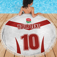 Full round beach blanket in white with red stripe, rose emblem, 'YOUR TEXT', 10, fringed border