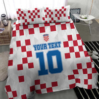 White duvet cover with red checkered pattern, custom text, and number 10 graphic