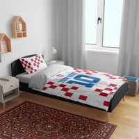 White duvet cover with red checkered design and number 10 custom text
