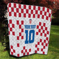 Custom white quilt with red checker squares and blue number 10 centerpiece