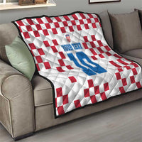 Custom quilt on sofa with white/red checker design and blue number 10 graphic