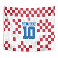 Folded white wall tapestry with red check grid, Croatia crest, and blue 10