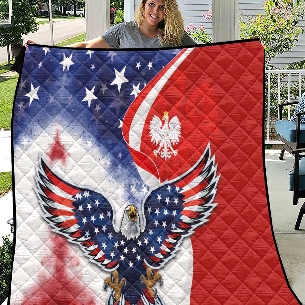 Quilt blanket showing winged eagle over white panel with red and blue borders