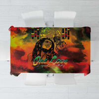 Reggae-themed birthday tablecloth with multicolor print and central portrait, One Love text