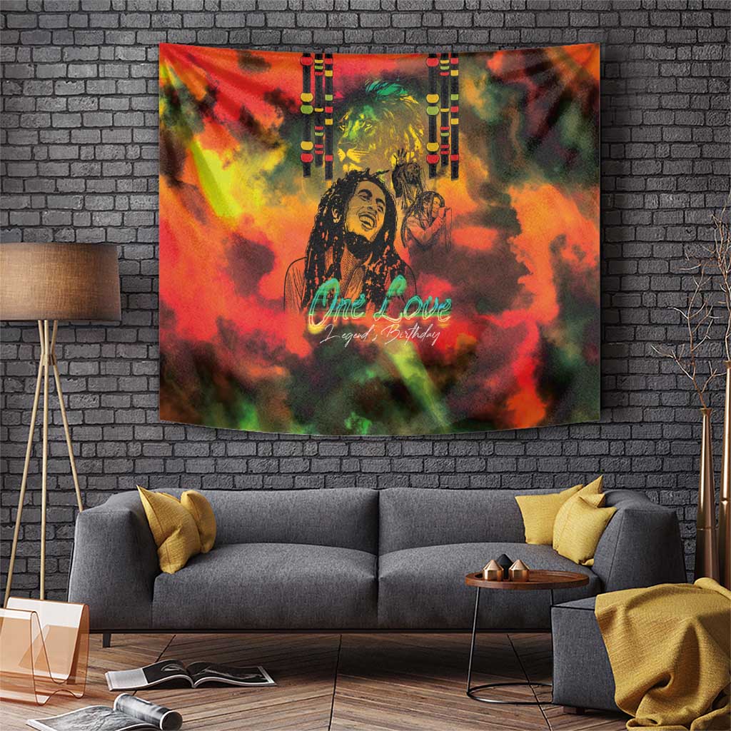 Wall tapestry with vivid orange-green smoke, central portrait, and “One Love” message