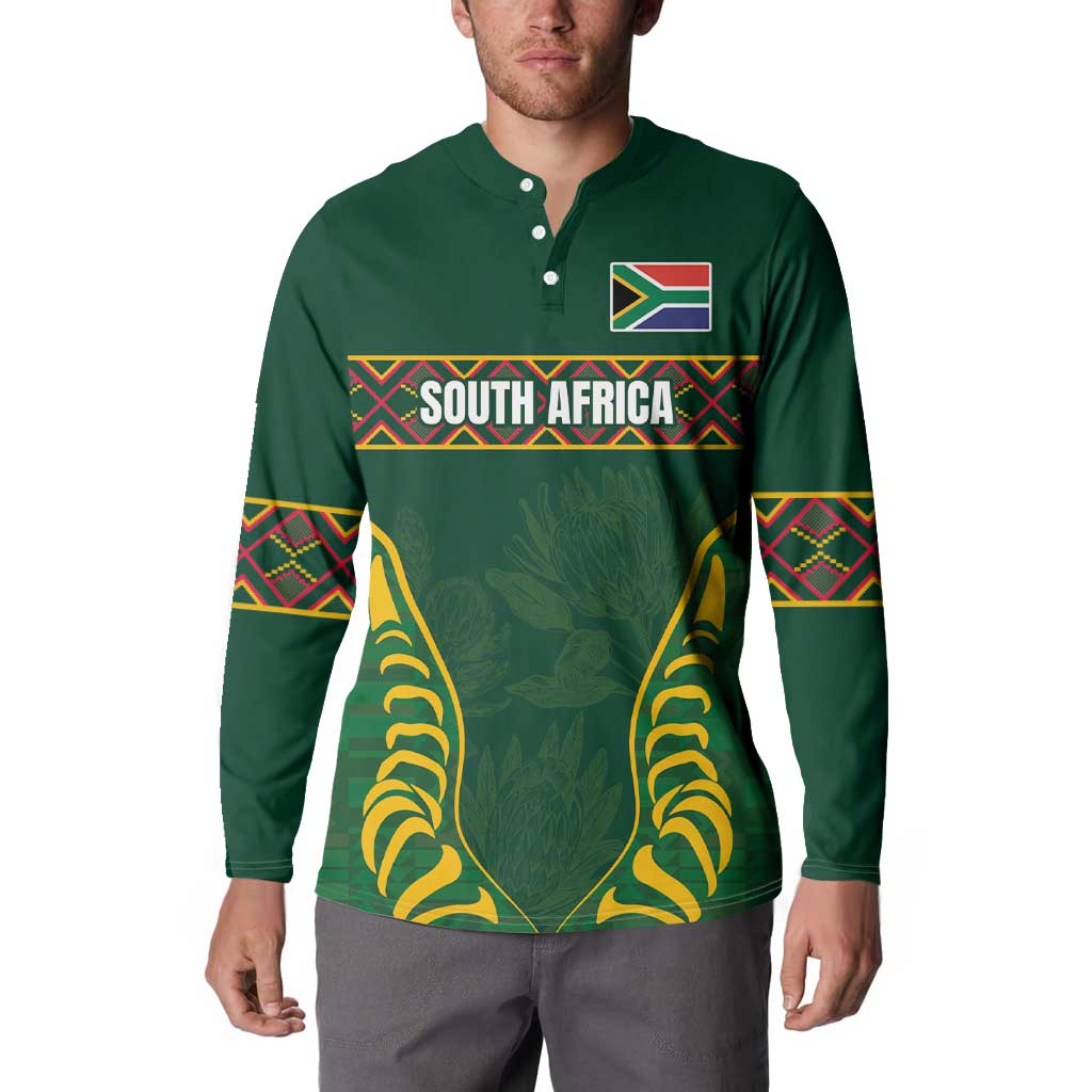 Green long-sleeve button sweatshirt with front graphic and patterned sleeve bands