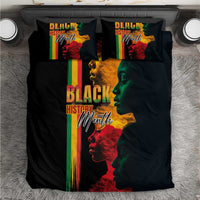 Black bedding set with rainbow stripe panel and Black History Month face artwork on duvet