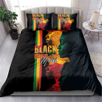 Black bedding set with colorful vertical stripes and Black History Month face graphic on duvet