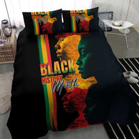 Black bedding set featuring rainbow stripe panel and Black History Month face print on duvet