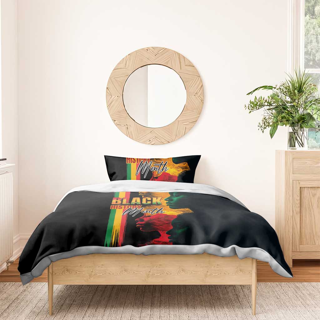 Black bedding set with Black History Month face graphic and rainbow stripe panel on duvet