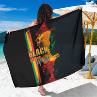 Black sarong wrap with multicolor Black History Month portrait graphic