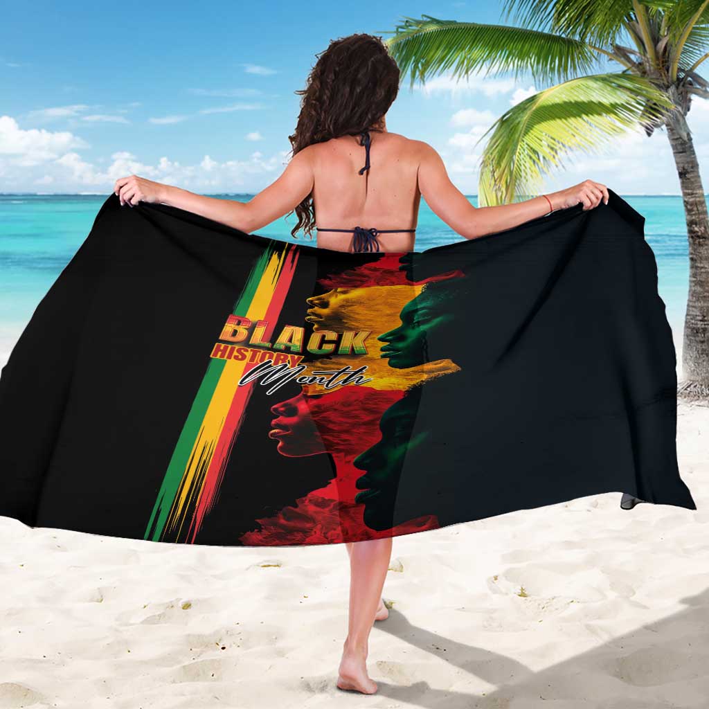 Black sarong wrap (back view) with multicolor portrait and Black History Month text